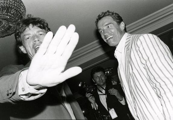 Mick Jagger with Arnold Schwarzenegger. In the back Richard Blanshard